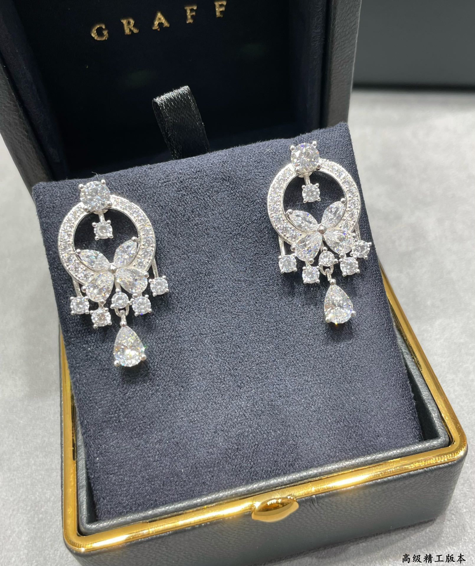 Gr*ff di*m*nd earrings