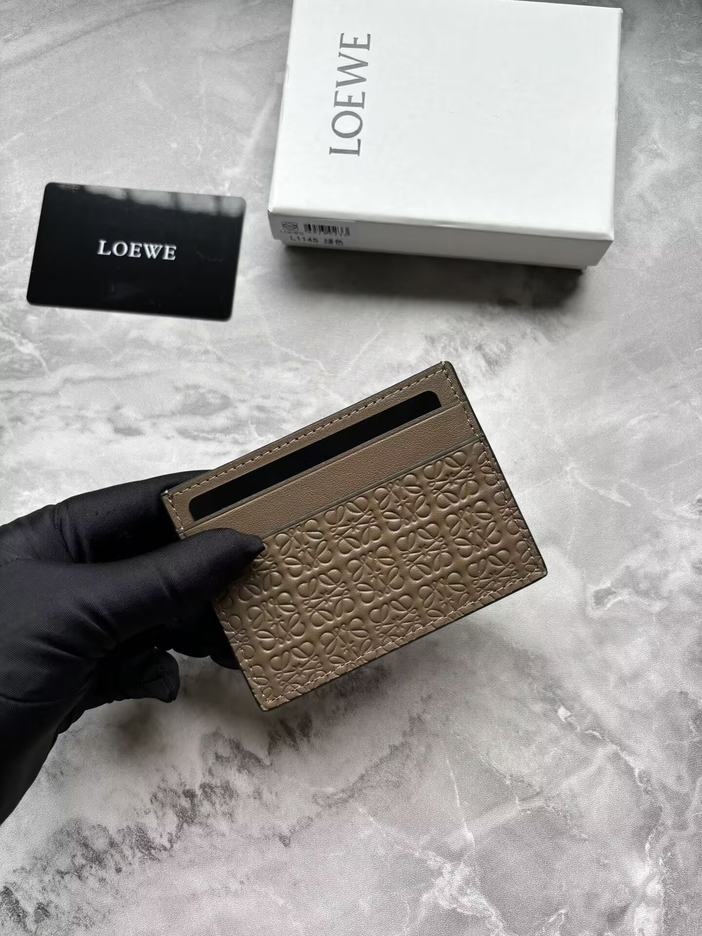 L0ew* cardholder