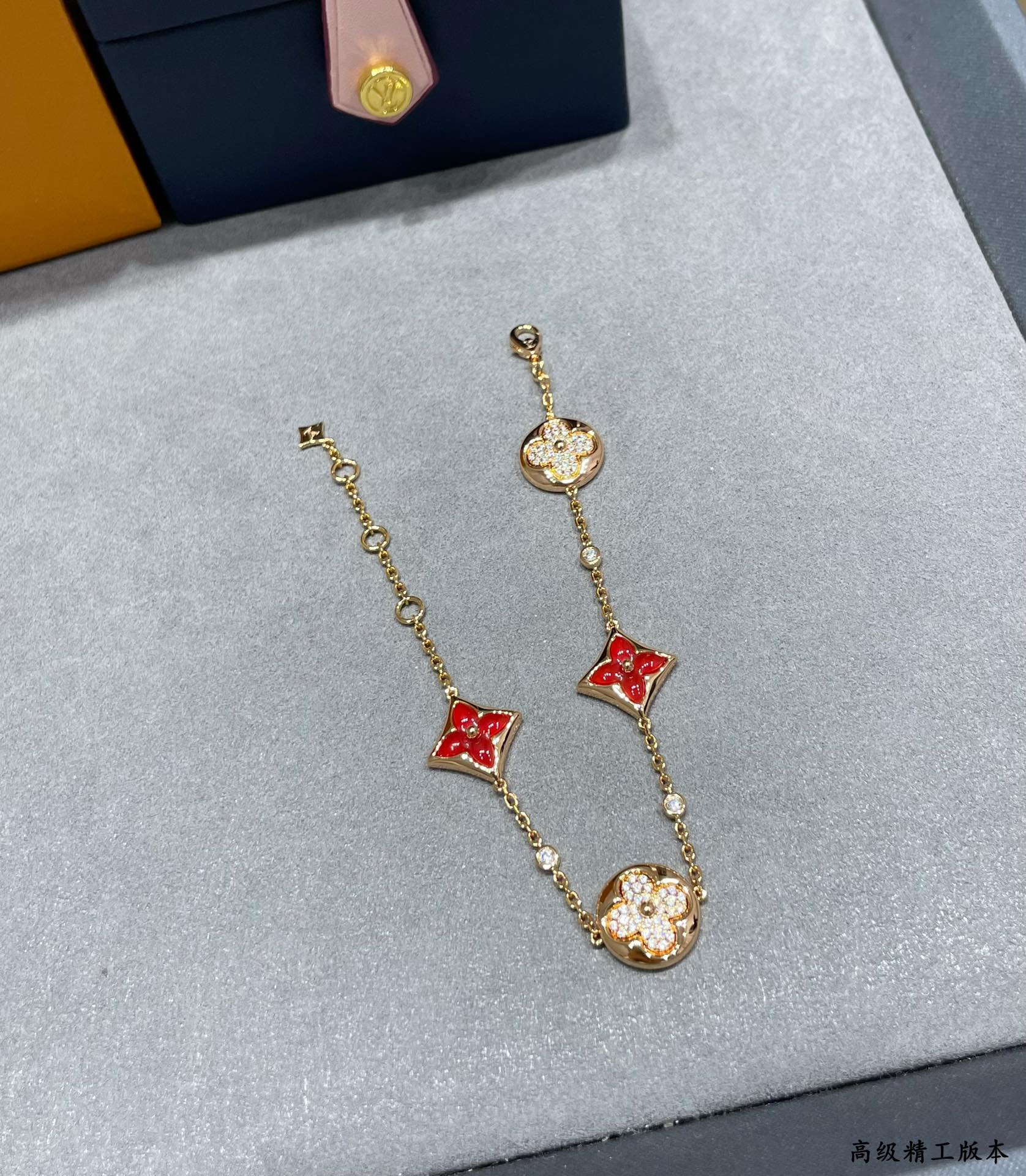 l0*is vuitto large with red agate and Di*m*nds four-flower bracelet