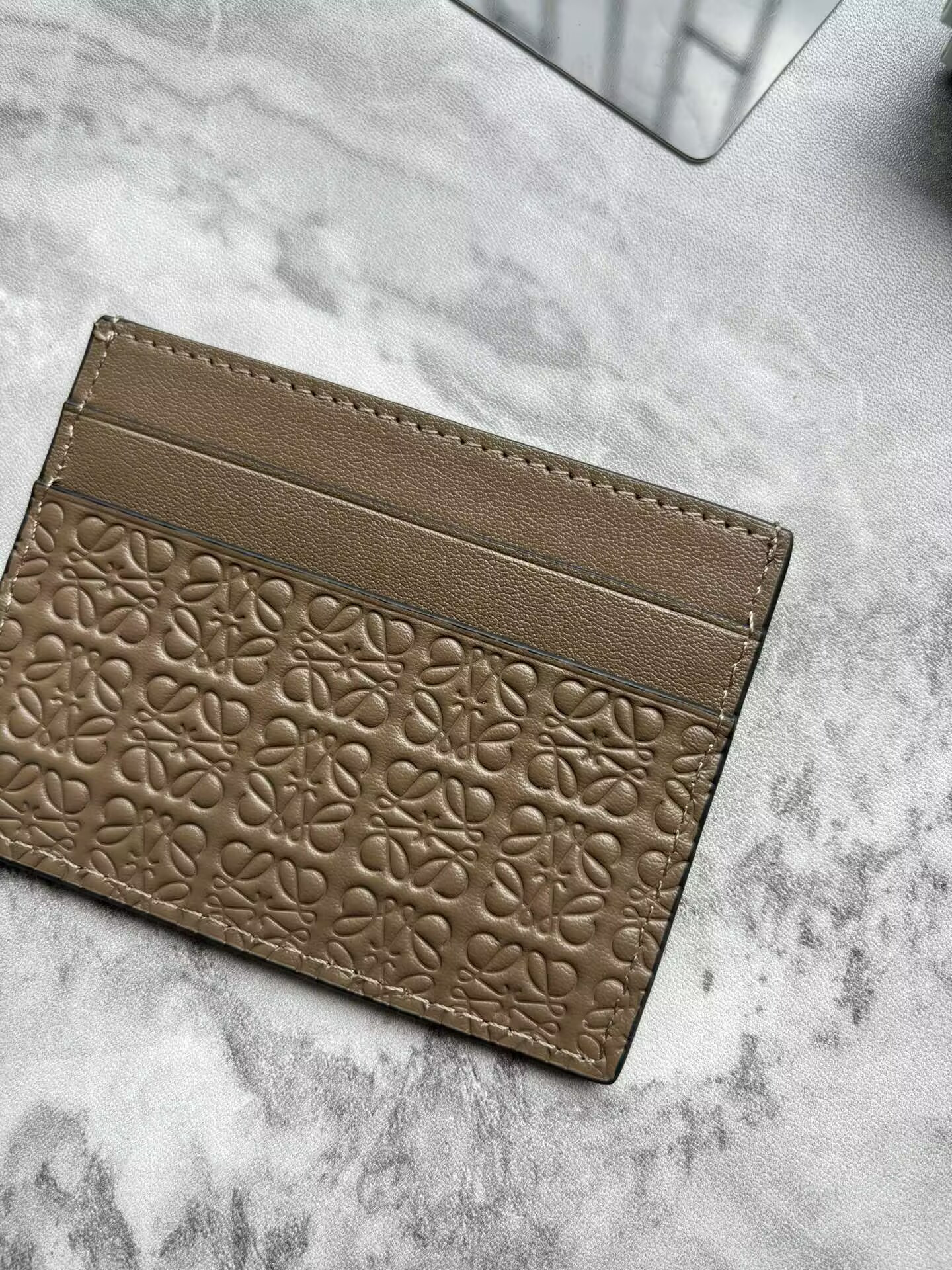 L0ew* cardholder