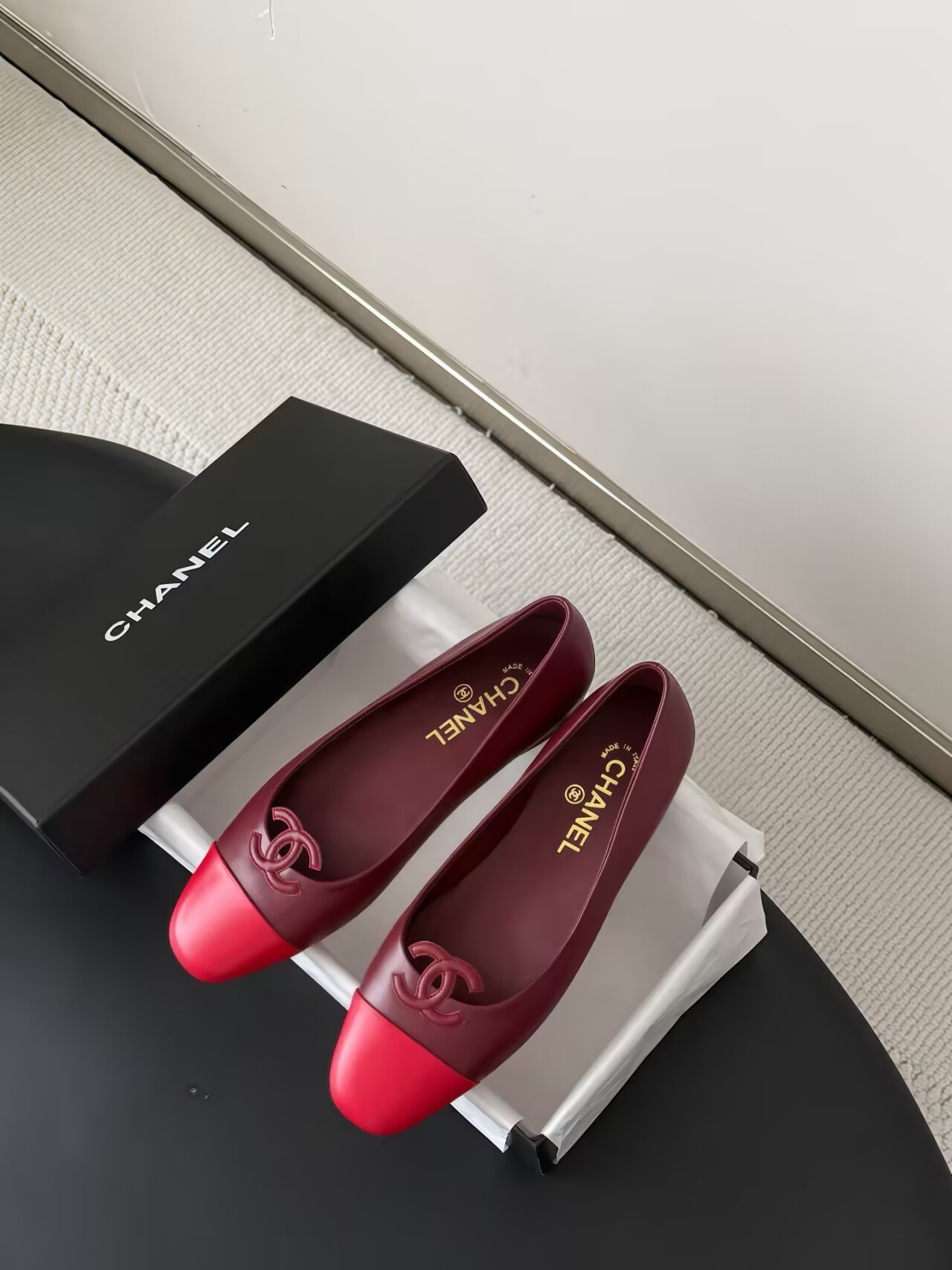 ua Ch*el leather ballet flats