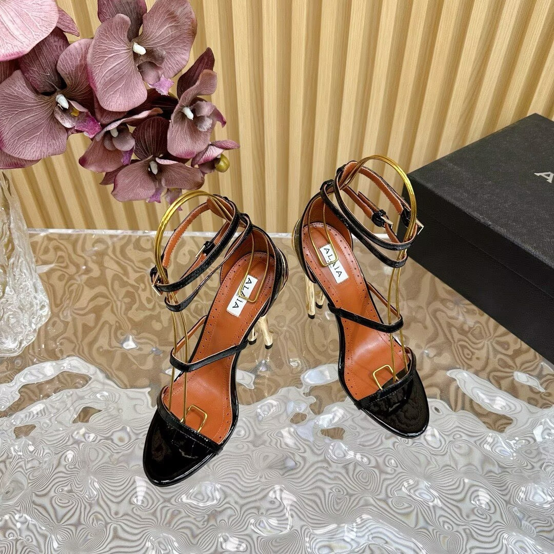 UA Alaïa Cabaret Patent Leather Sandals