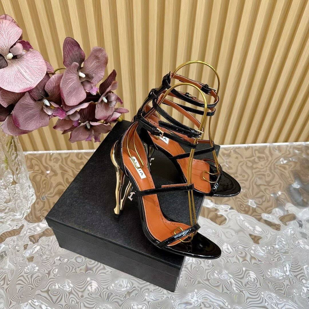 UA Alaïa Cabaret Patent Leather Sandals