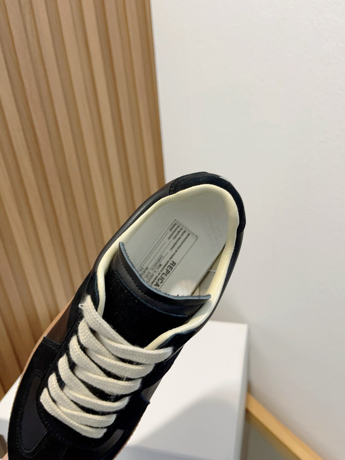 ua ma*s*n Ma*i*la mm6 black sneakers