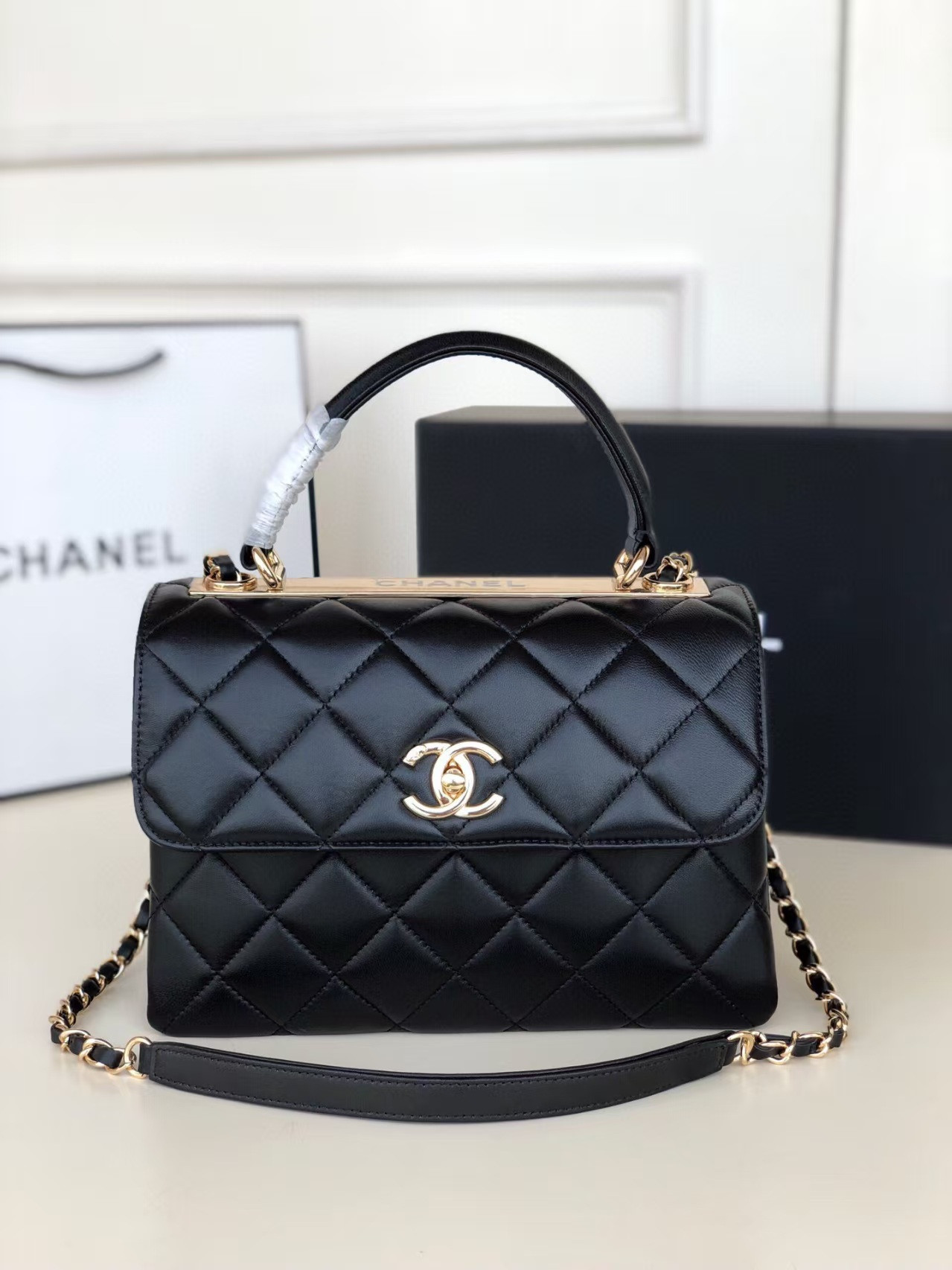 Ch*el flap bag with top handle 6.6 × 9.8 × 4.7 in