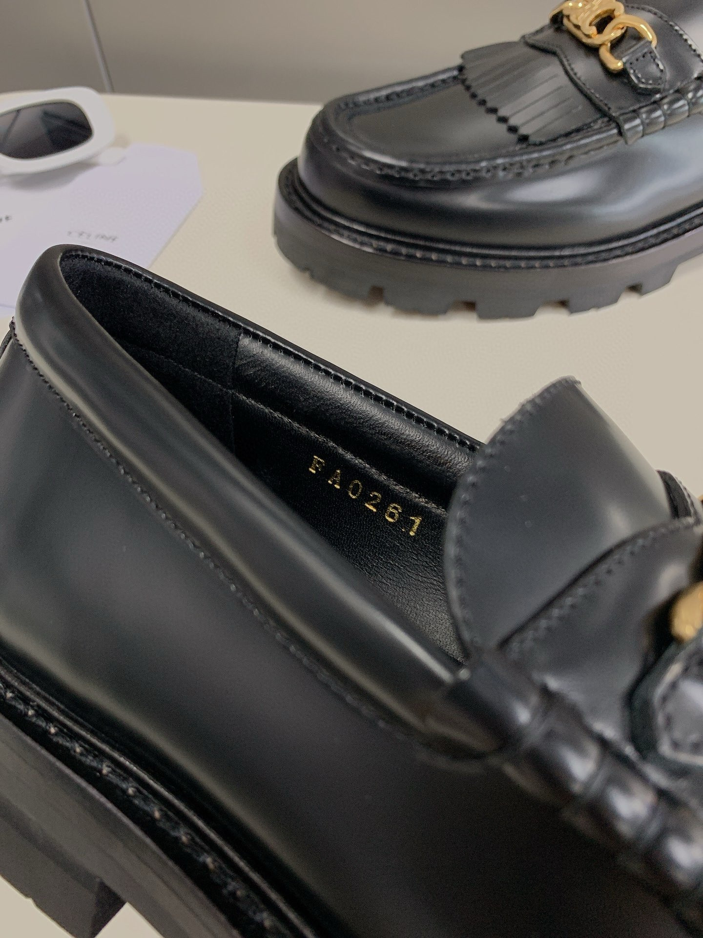 ua Ce**e margaret triomphe chain loafers
