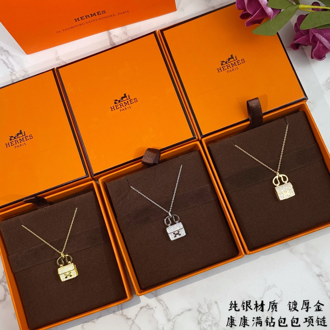 H**me5 fully di*m*nd-encrusted h bag necklace