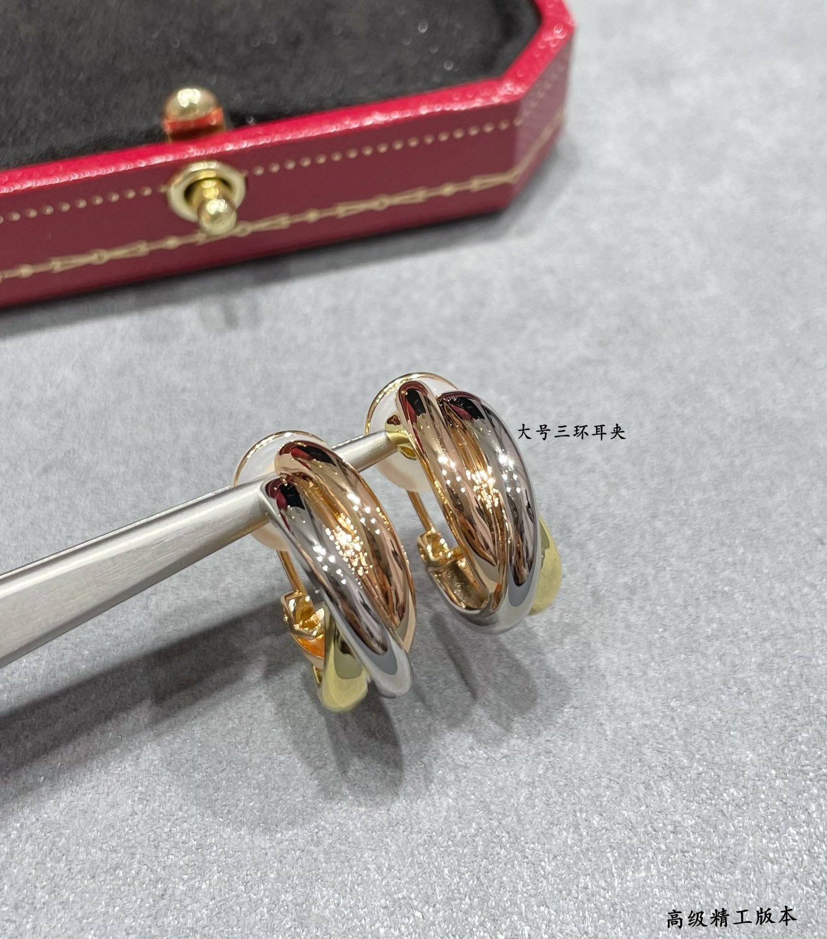 Ca*t*er large three-hand earrings