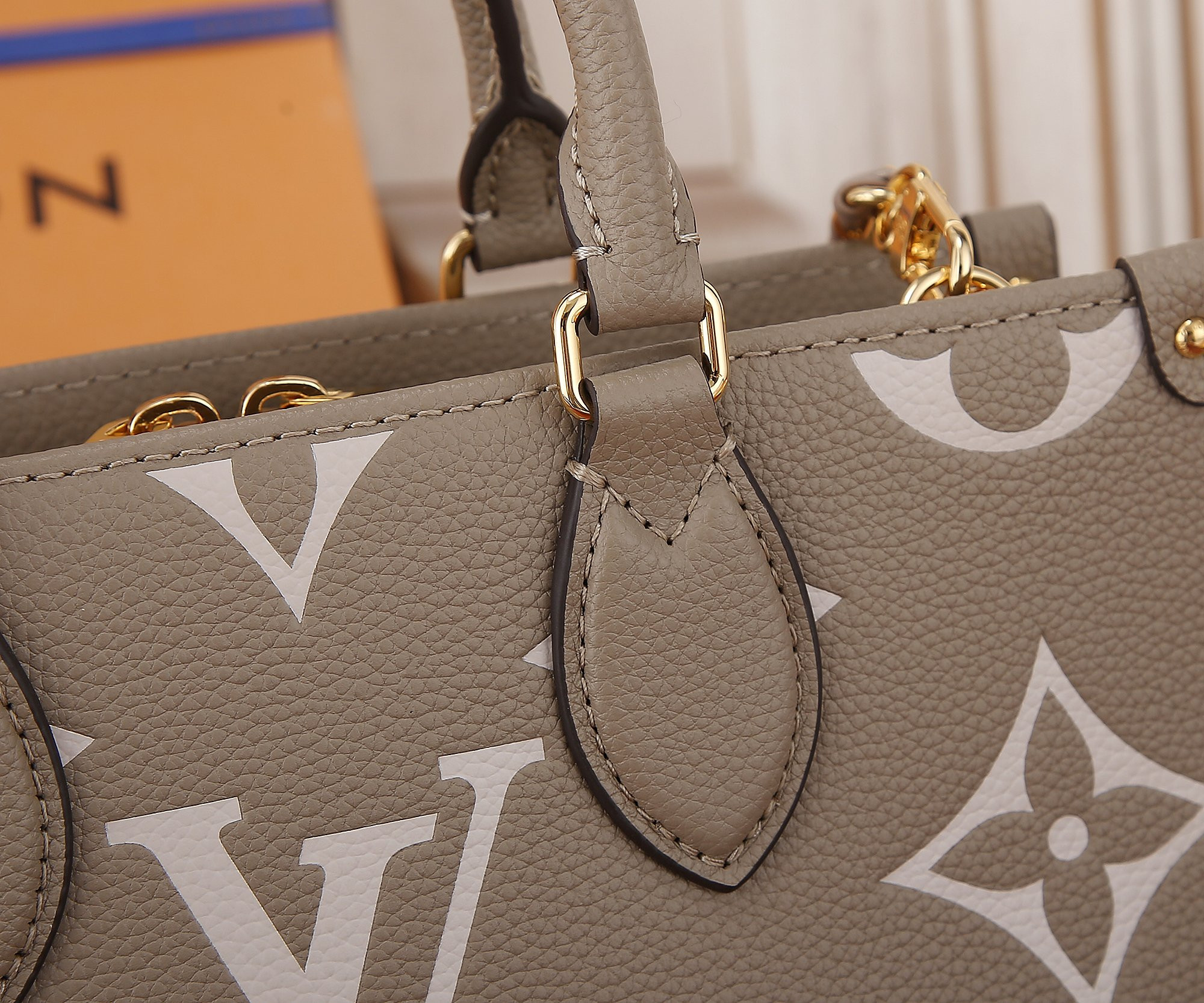 LV OnTheGo East West M23641 9.8 x 5.1 x 3.9 inches