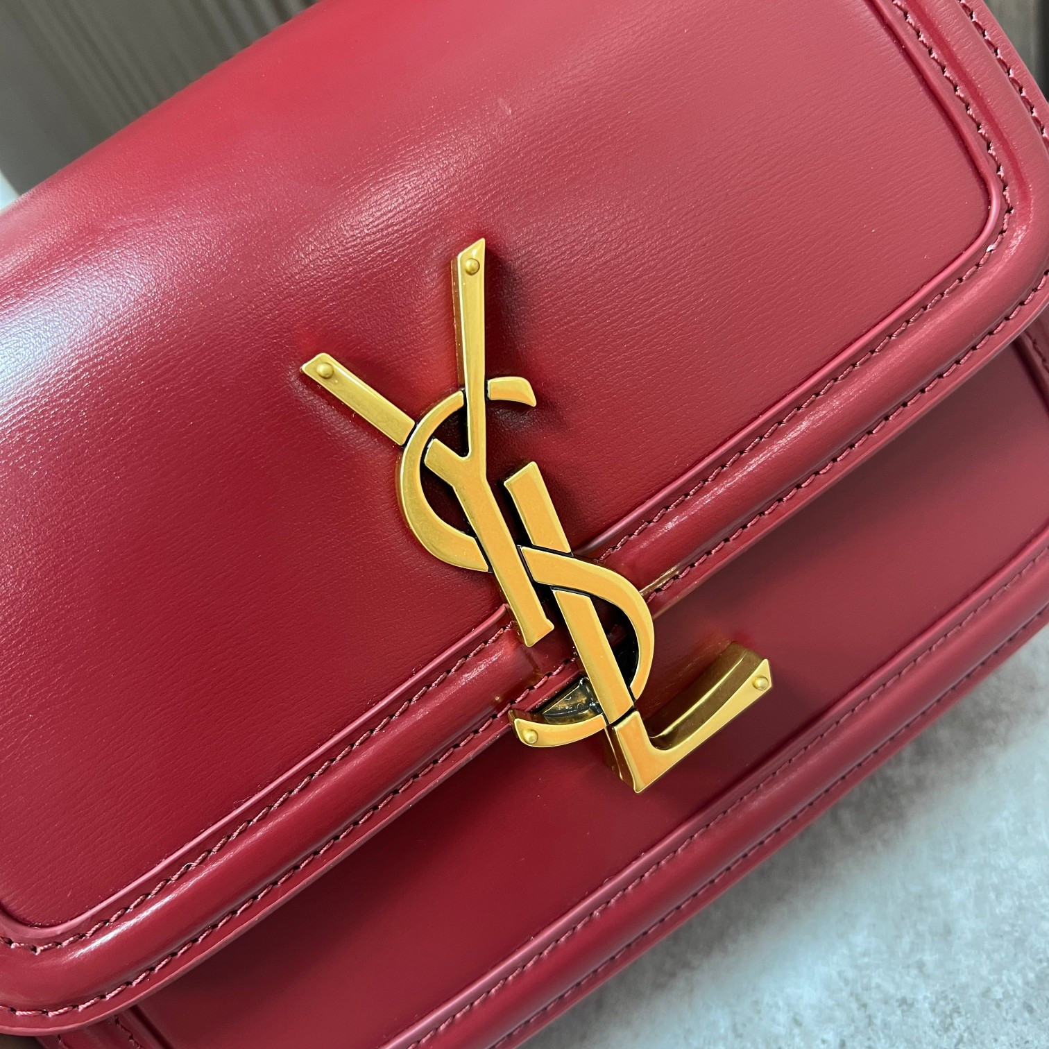 y*l solferino small satchel in box Sa**t Lau*nt red 7.4 x 5.1 x 1.9 inches