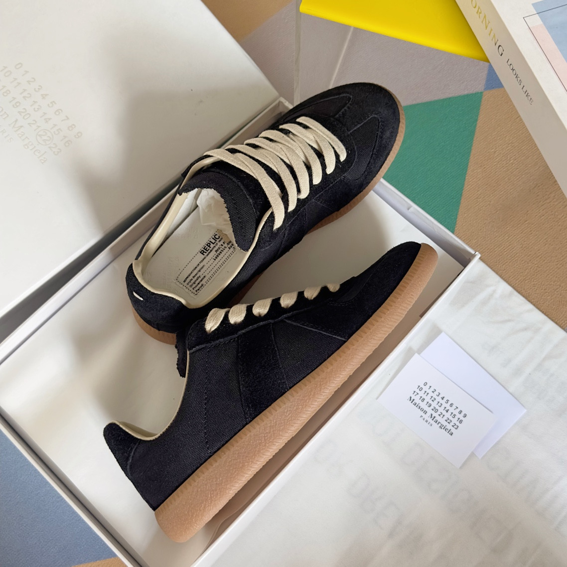 ua ma*s*n Ma*i*la mm6 sneakers