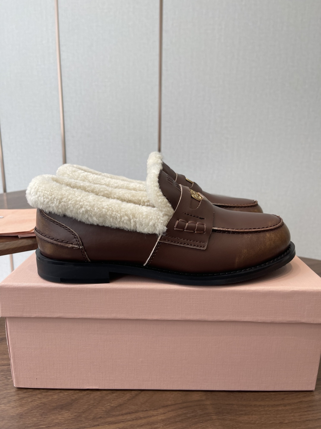 ua M1v M1v bleached leather and shearling penny loafers