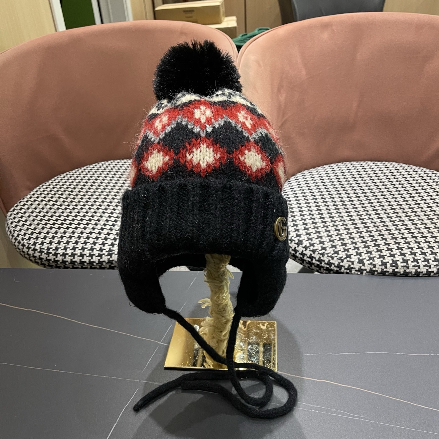 G*u*i knit trapper hat