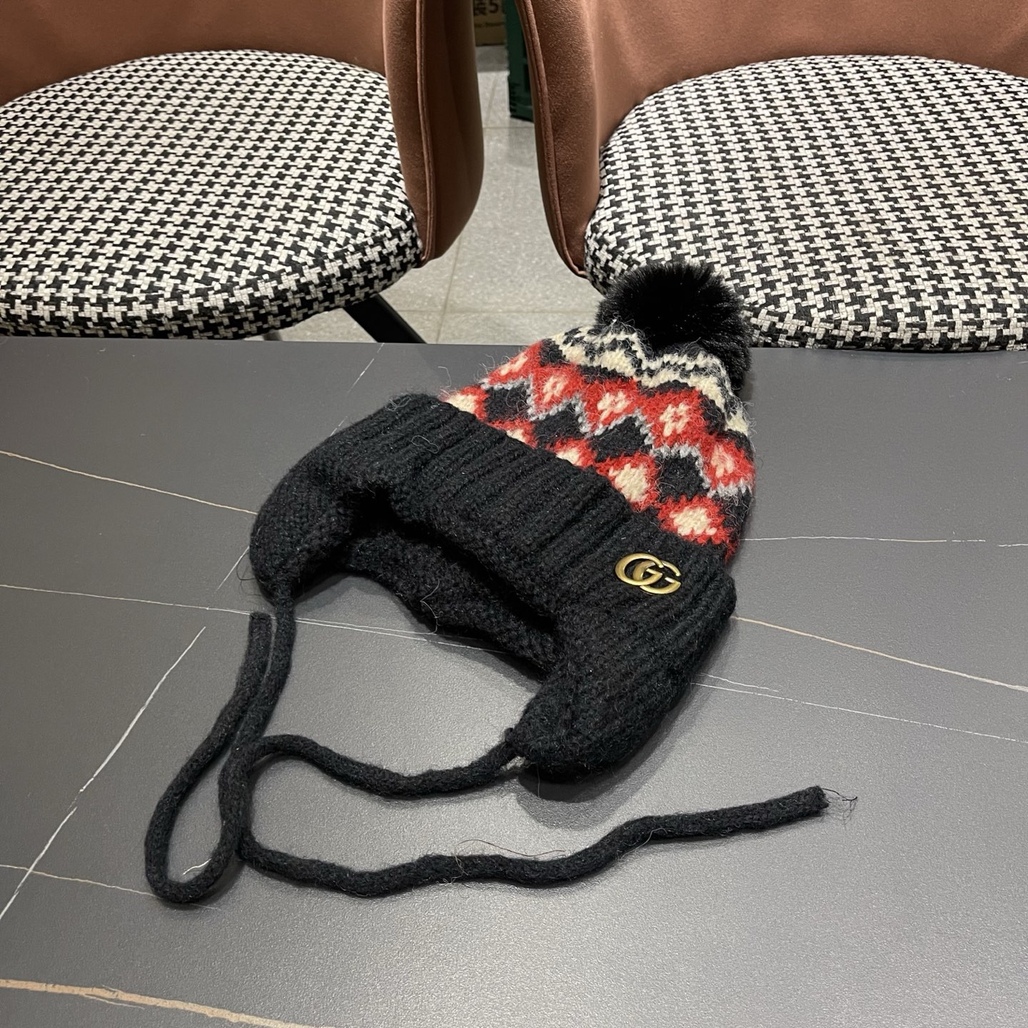 G*u*i knit trapper hat