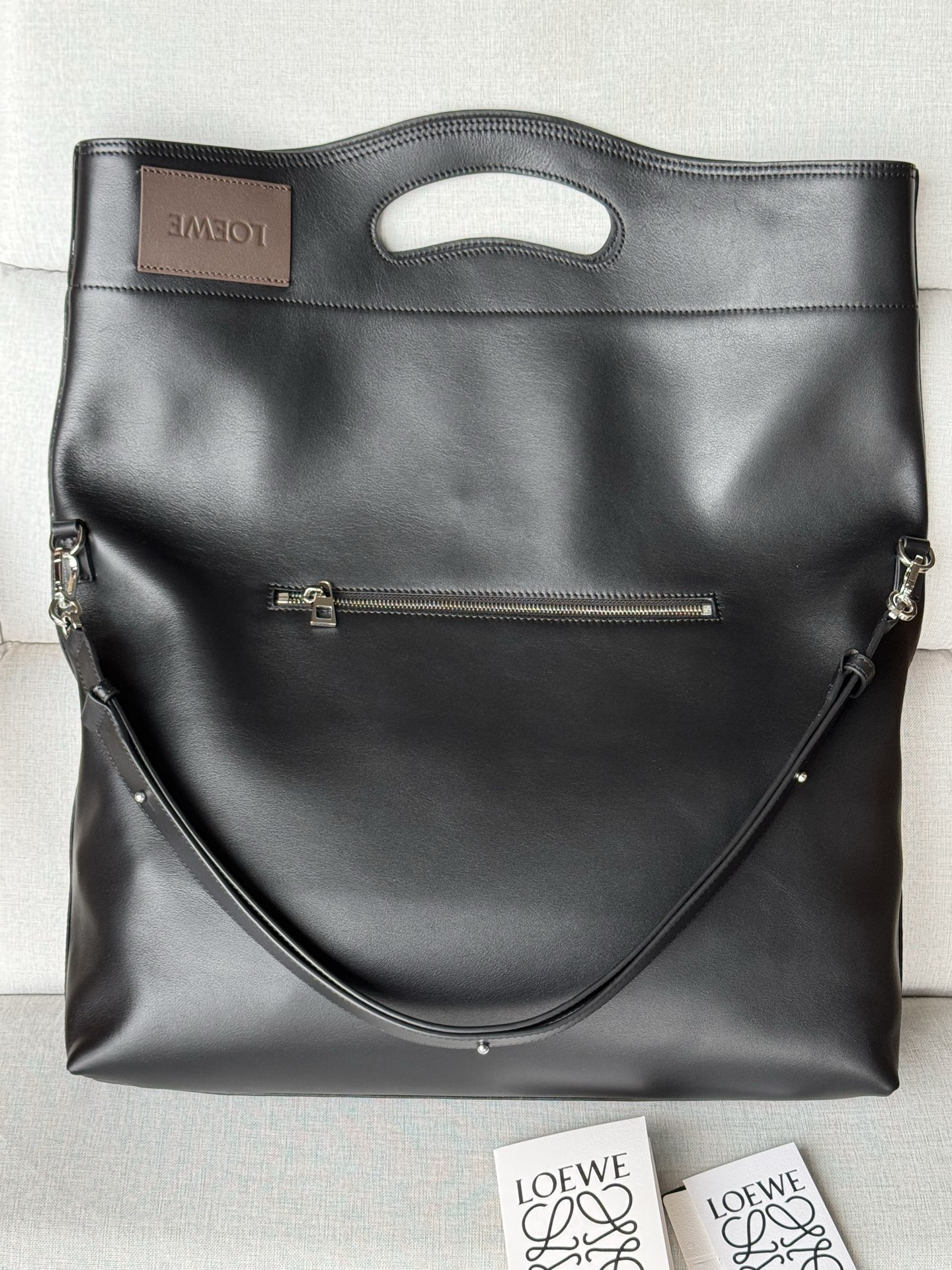 l0ew* bob folded tote in shiny S*pple calfskin